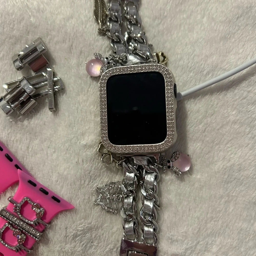 Apple Smartwatch Accessories with Pink and Black Bands and Silver Chain Bracelet